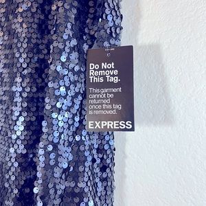Party dress from express with tags on it, the color is midnight blue and new.